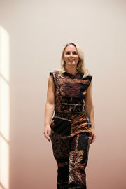 Jess in Poppy Jumpsuit gold and black